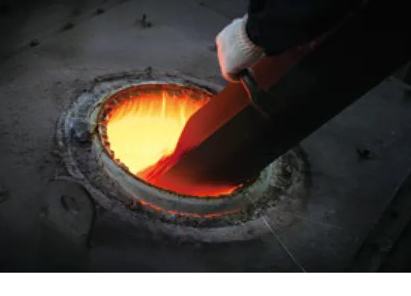 Placing raw materials in the furnace